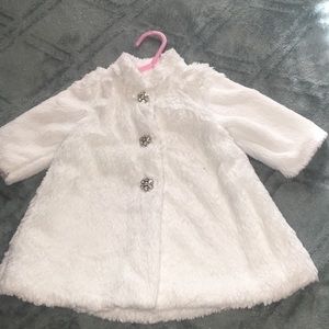 White infant coat